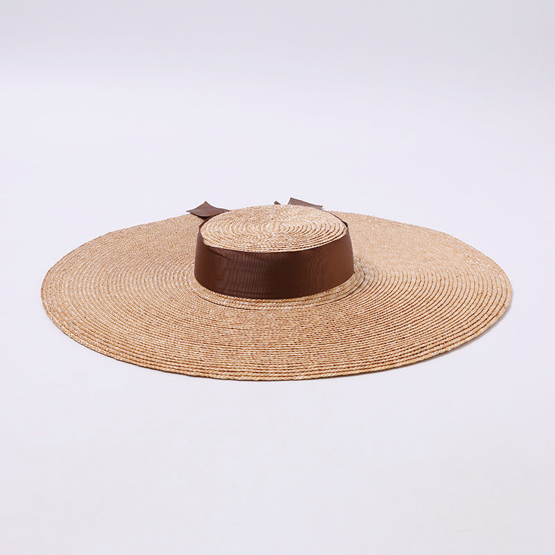 Vintage Wide-Brim Raffia Hat with Brown Ribbon